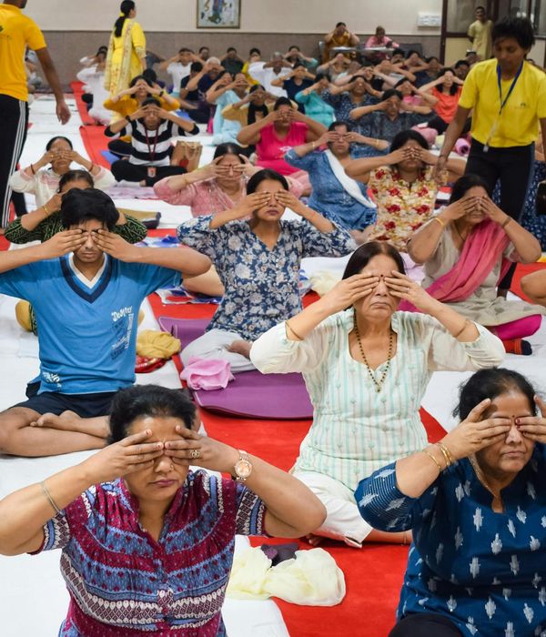Person practicing mindfulness and eye relaxation techniques