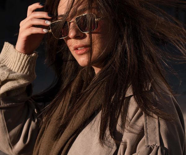 Smiling person feeling energized after a visual break